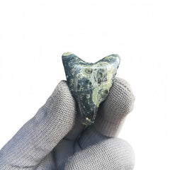 Sunshcat hand-carved natural stone wolf head with polished surface.