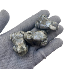 Sunshcat hand-carved rhyolite frog crystal, a unique desk accent fostering focus and serenity.