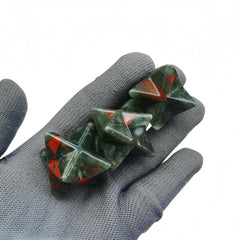Sunshcat hexagonal-star crystal closeup showing calming energy.