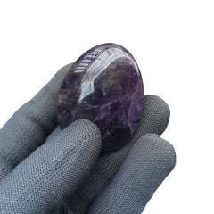 Sunshcat natural amethyst crystal shows color and subtle vibration supporting meditation.