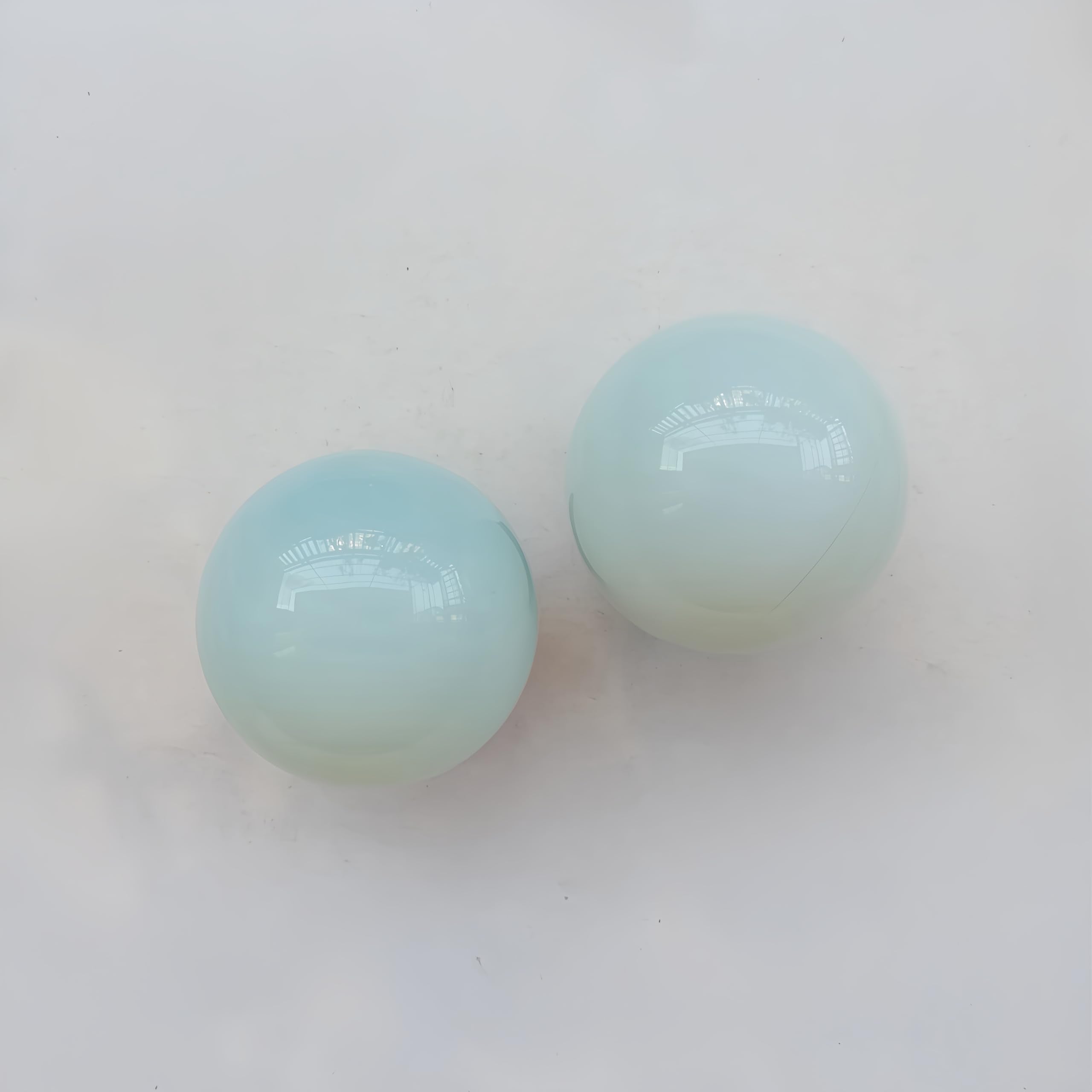 Sunshcat Opalite ball used for divination and visual meditation at home.