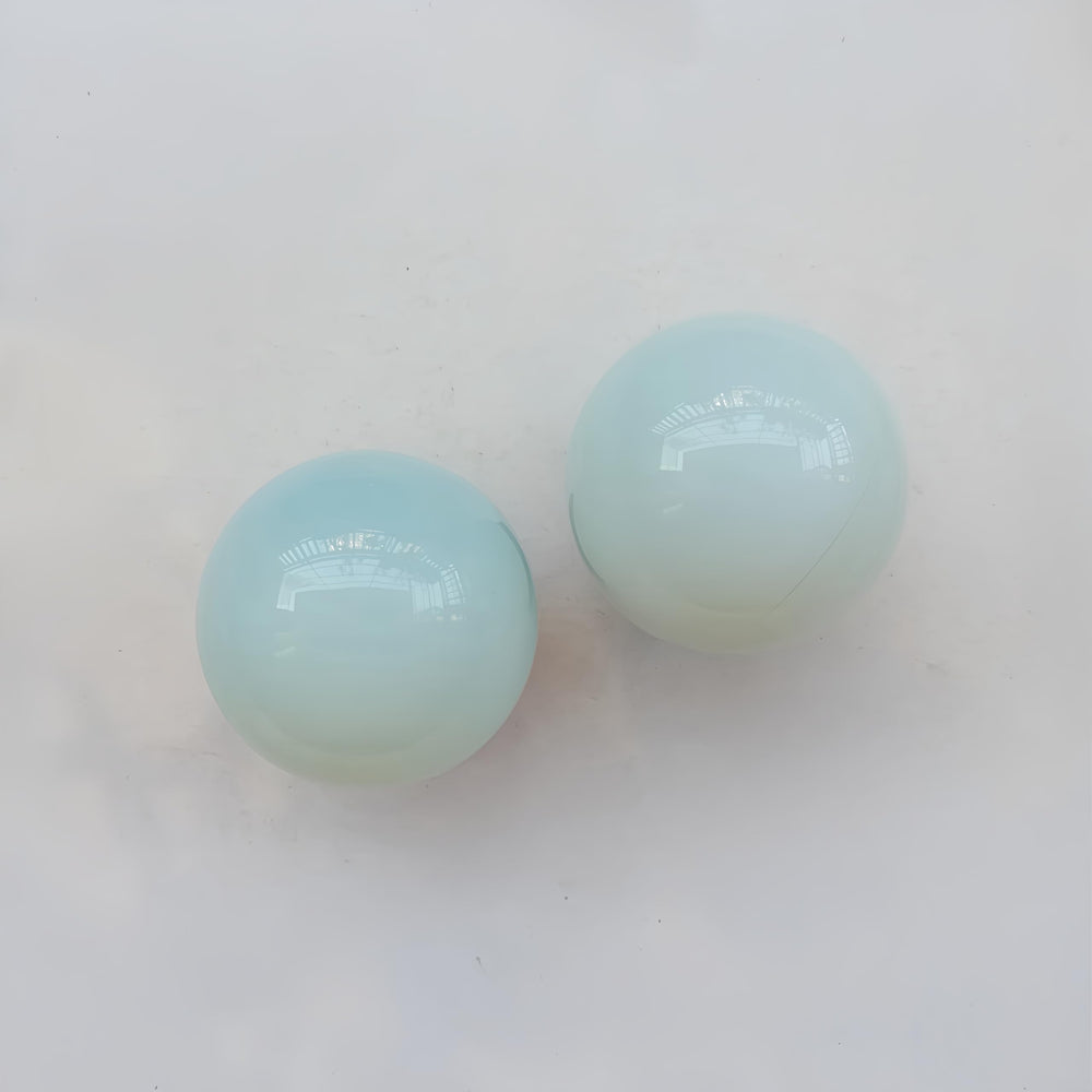 Sunshcat Opalite ball used for divination and visual meditation at home.