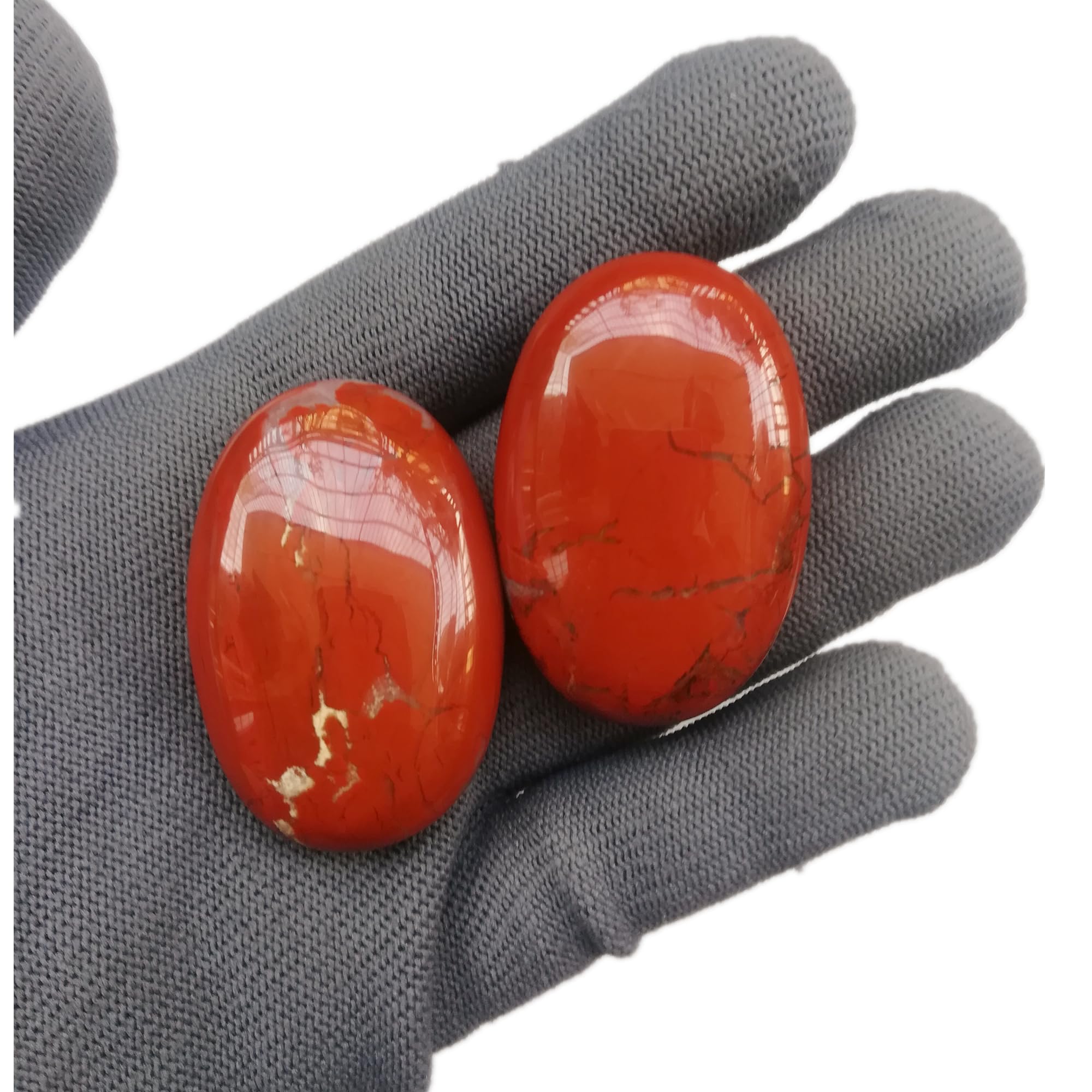 Sunshcat oval crystal energy stone held in hand for grounding
