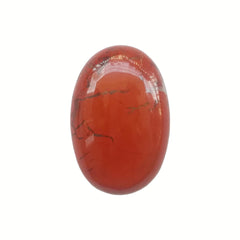 Sunshcat red jasper palm stone close-up for meditation and calm