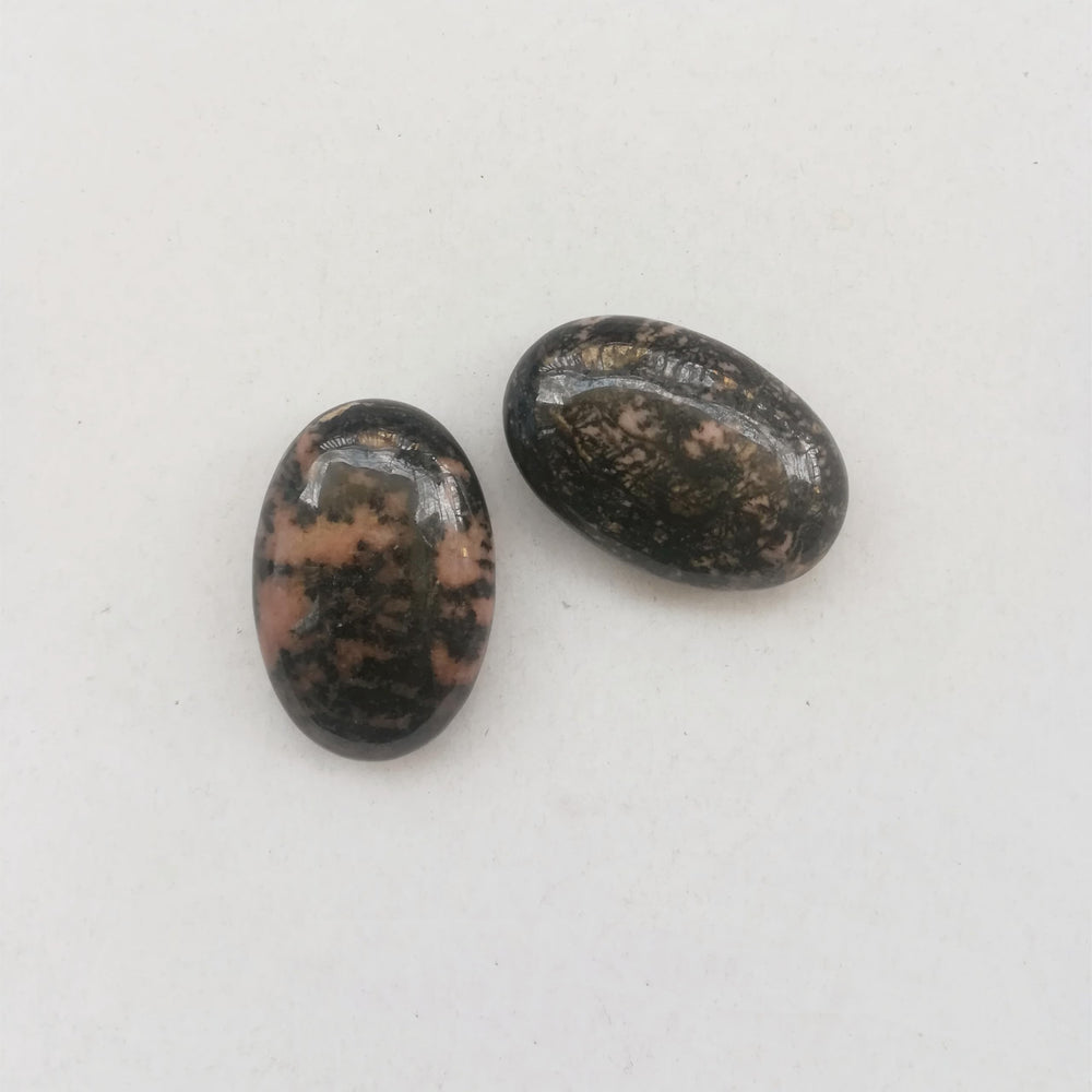 Sunshcat rhodonite palm stone ideal for meditation, stress relief, and mindful breathing