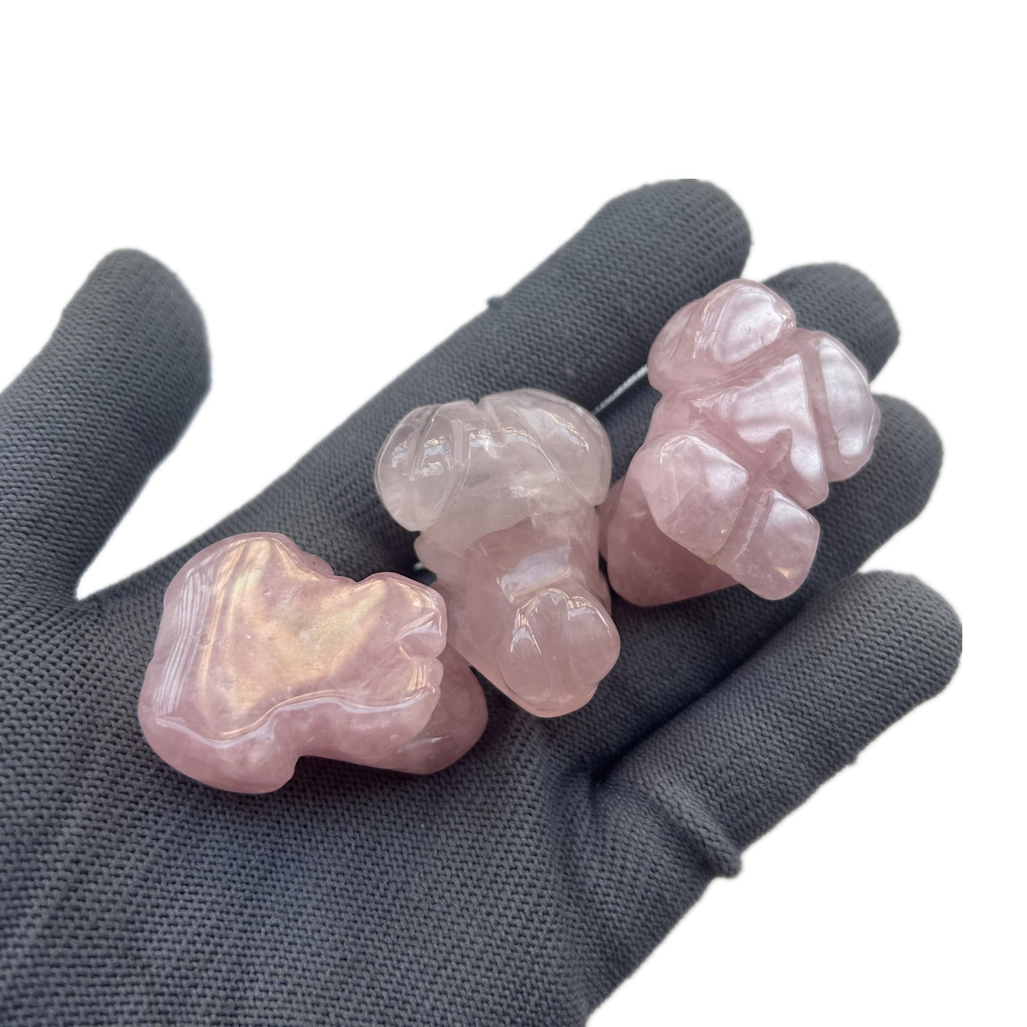 Close-up of Sunshcat rose quartz frog facial detail for meditation calm.