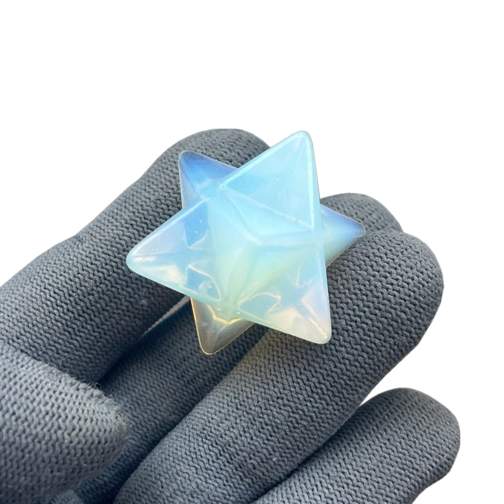 Sunshcat synthetic opalite Merkaba hexagonal star crystal designed for meditation and energy alignment.