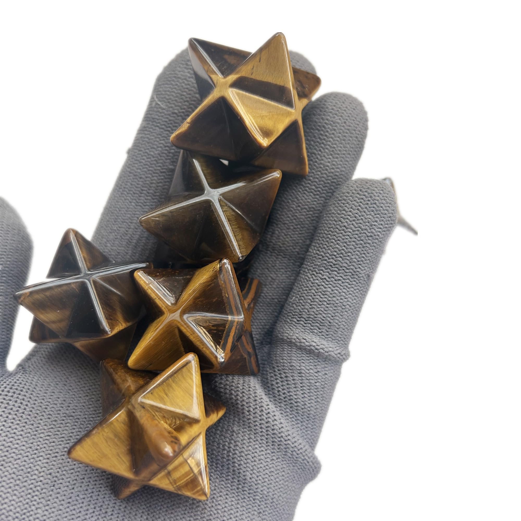 Sunshcat Tiger's Eye Merkaba hexagonal star crystal, side view, supports focus and emotional balance.