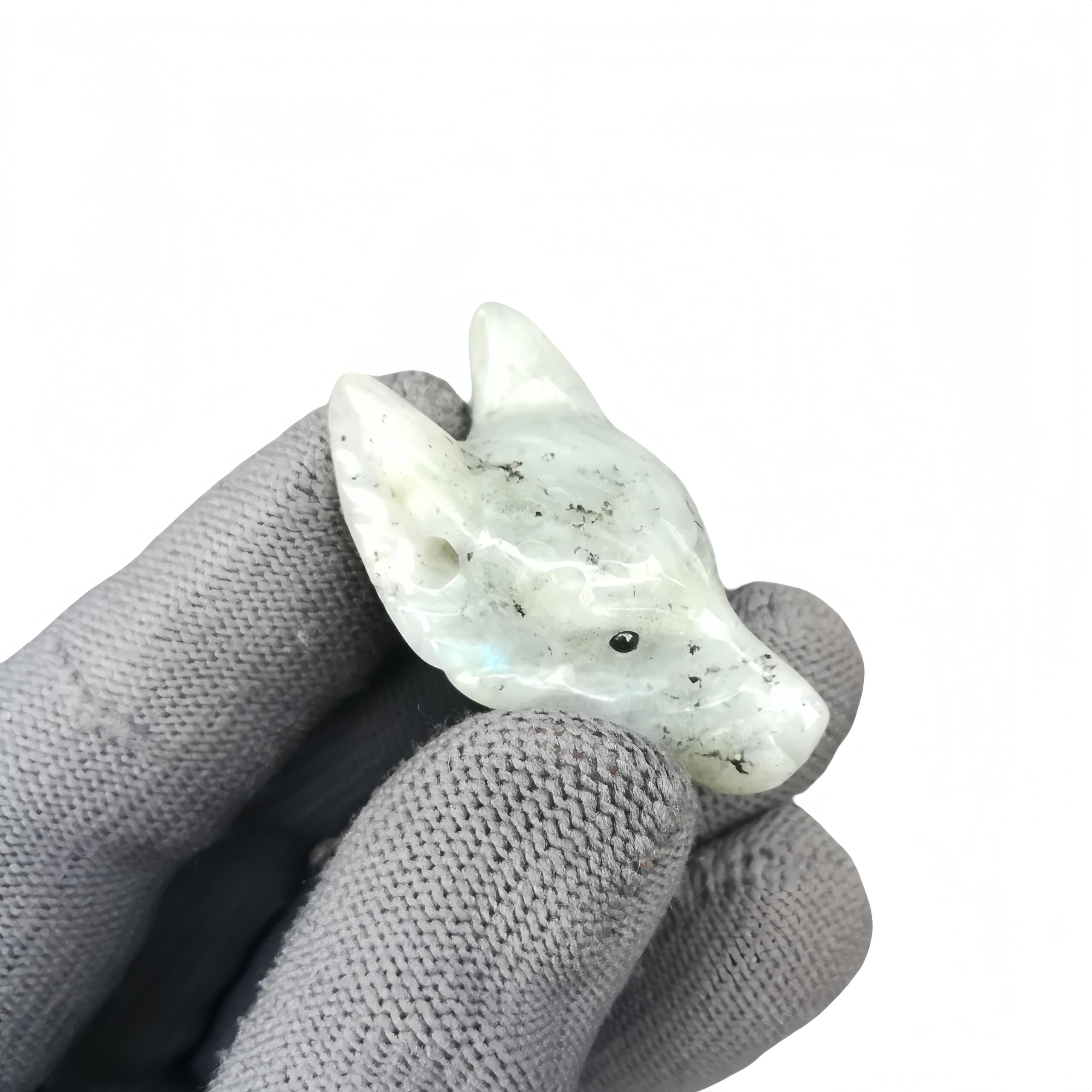 Sunshcat Moonstone Wolf Head Figurine polished surface catches light beautifully.