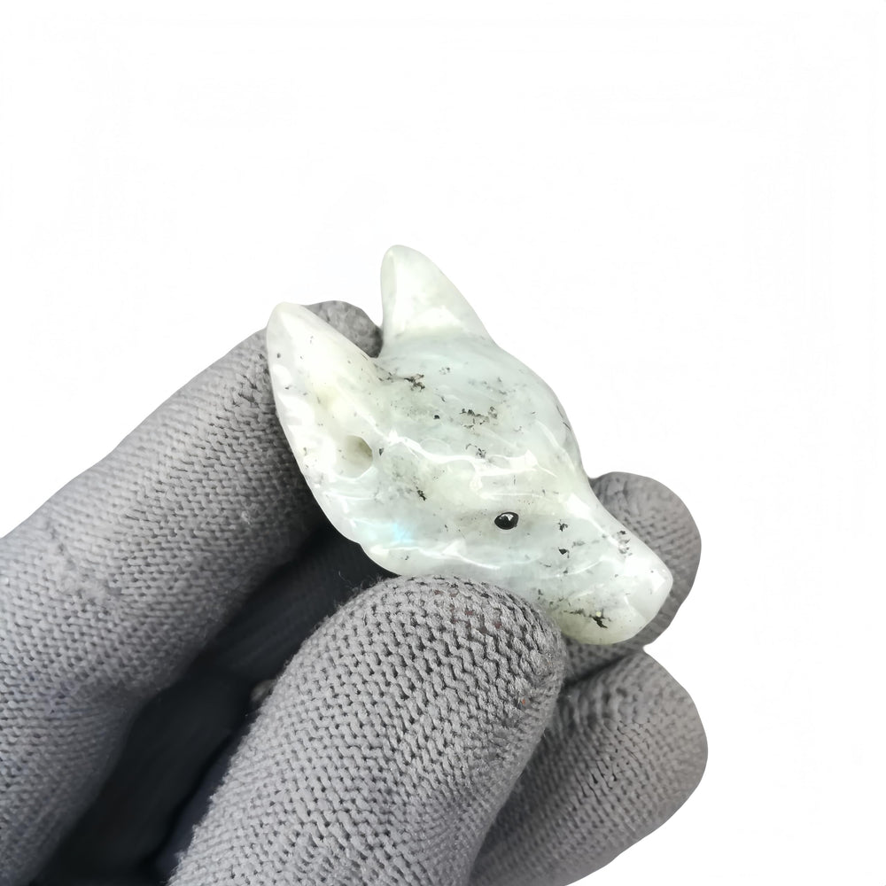 Sunshcat Moonstone Wolf Head Figurine polished surface catches light beautifully.