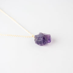 Sunshinegems amethyst crystal closeup showing natural violet hues for a unique gemstone look.