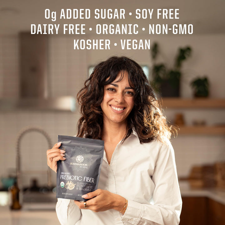 Sunwarrior Be Well prebiotic fiber stirred into smoothie for plant-powered daily routine