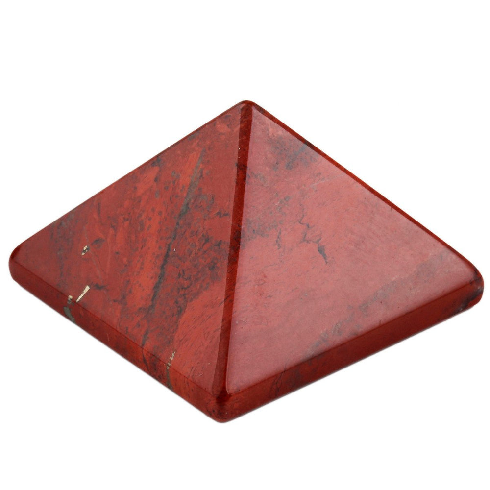 SUNYIK crystal point for meditation and energy amplification on a desk.