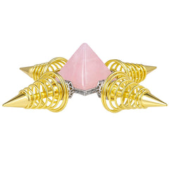 Gold-plated pyramid detail on rose quartz, showcasing craftsmanship and focal energy point.
