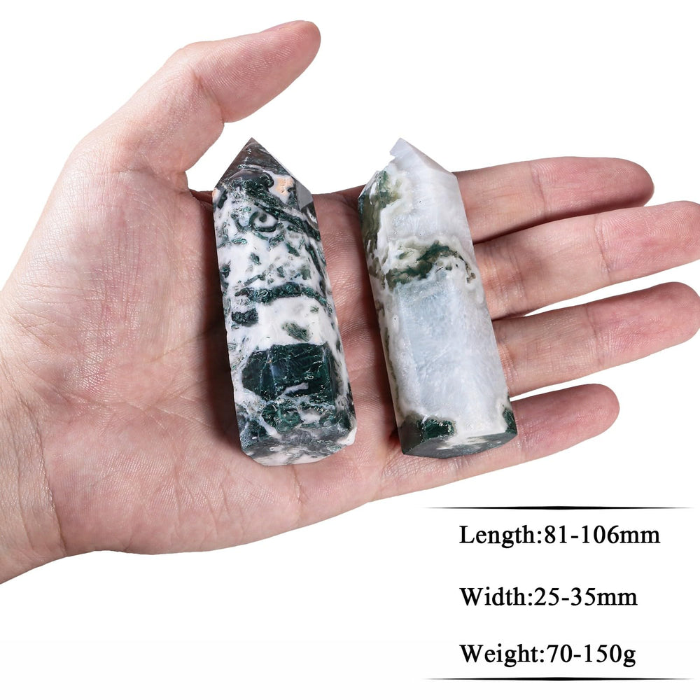 SUNYIK moss agate wand held in hand highlighting compact pocket size for practice
