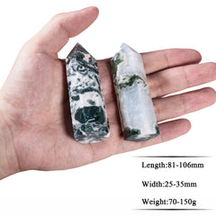 SUNYIK moss agate wand held in hand highlighting compact pocket size for practice