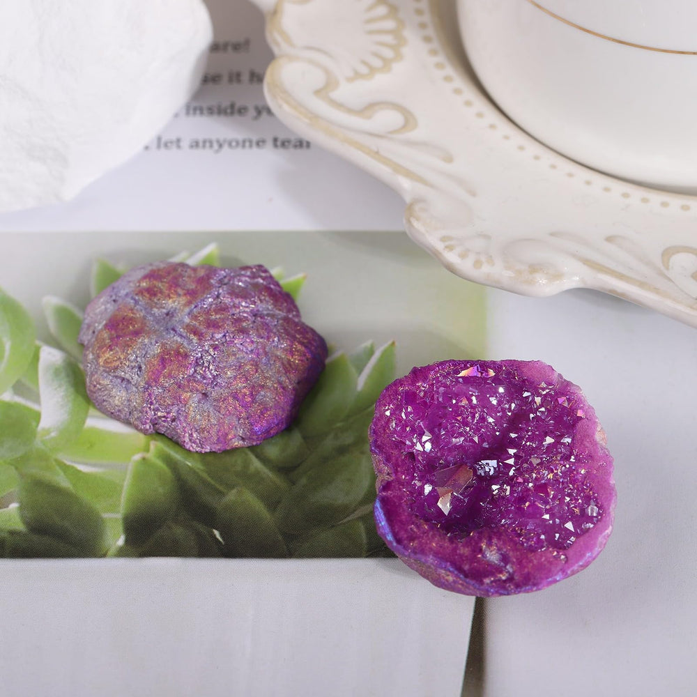 SUNYIK crystal geode with purple AB coating gleams under light