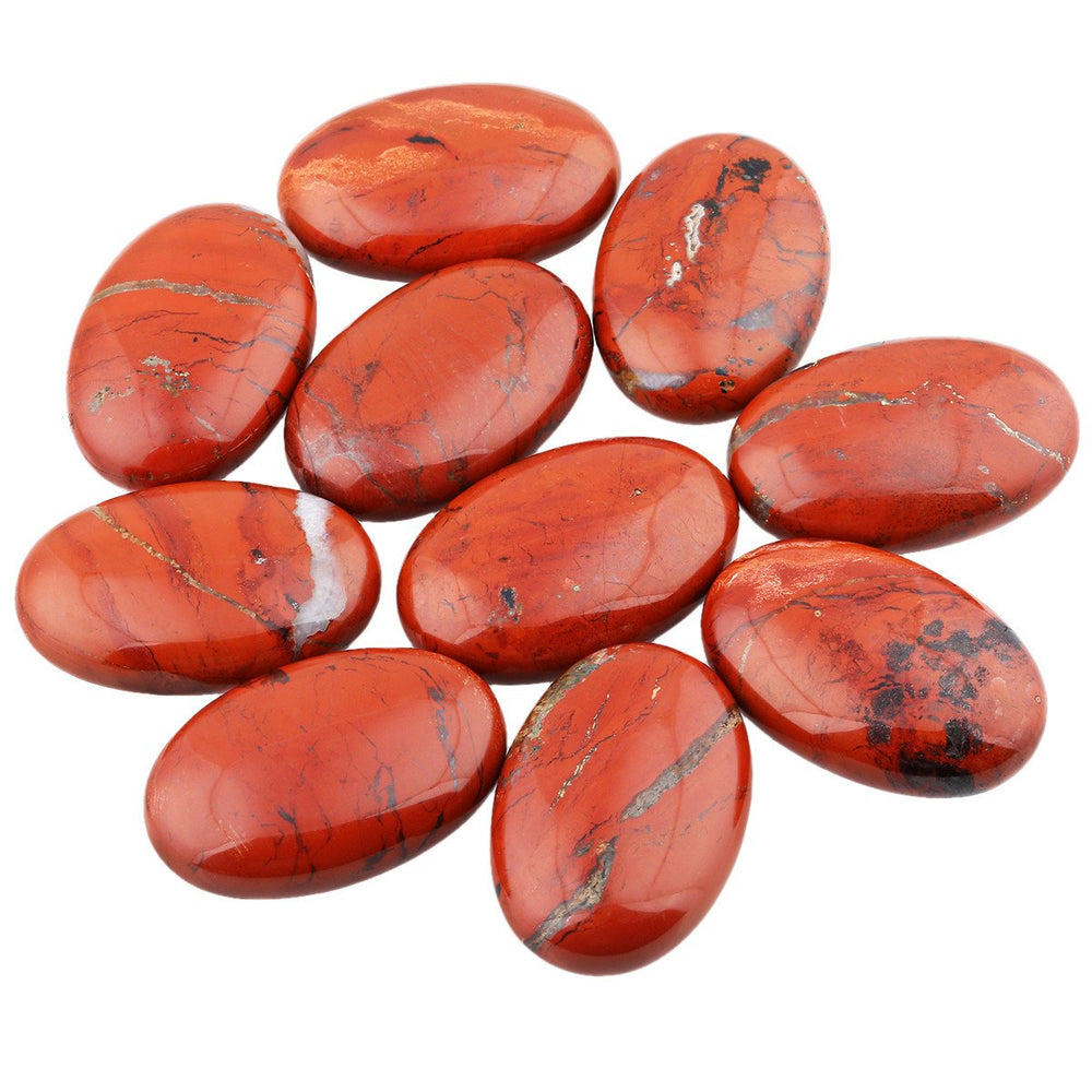 SUNYIK Red Jasper oval palm stone enhances focus during yoga.