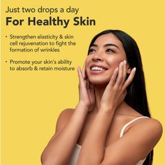 Super Natural Goods liquid biotin-collagen dropper shows easy daily dosing for hair health.