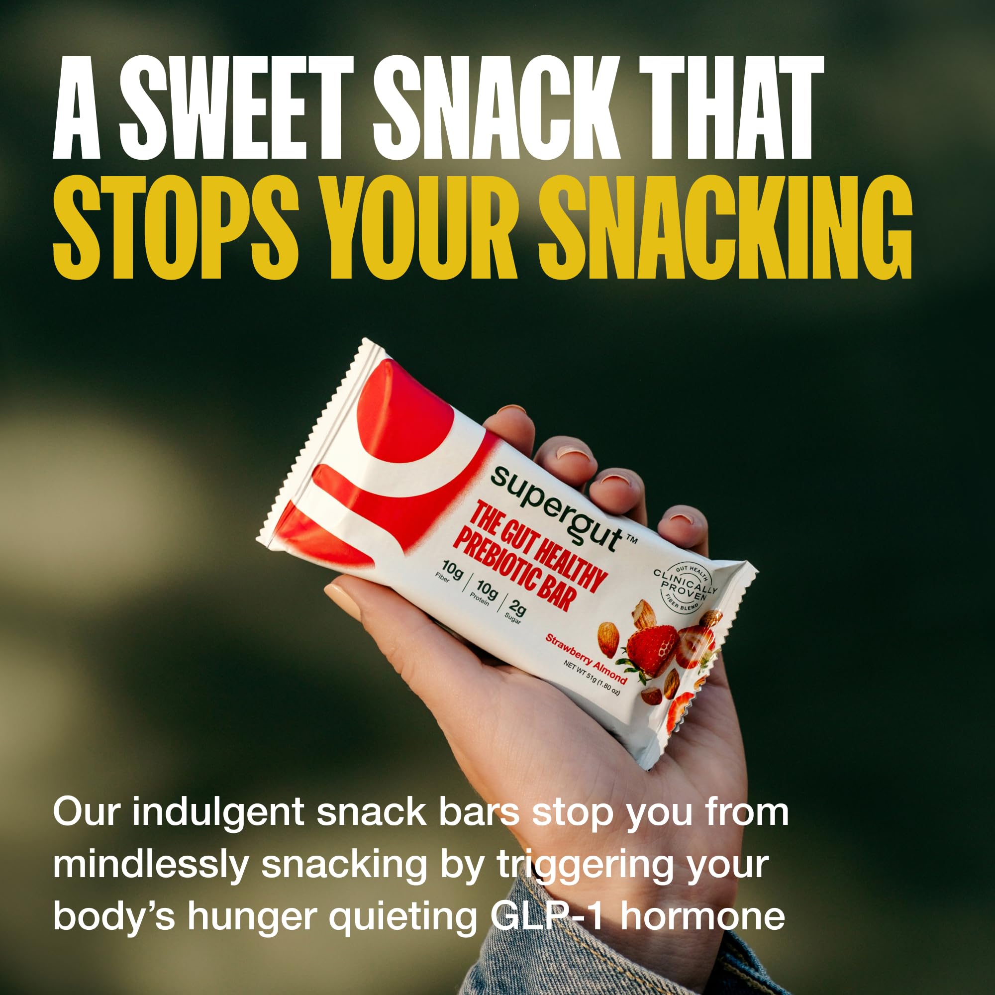 Supergut GLP-1 Bar strawberry almond bite close-up, emphasis on flavor and texture.
