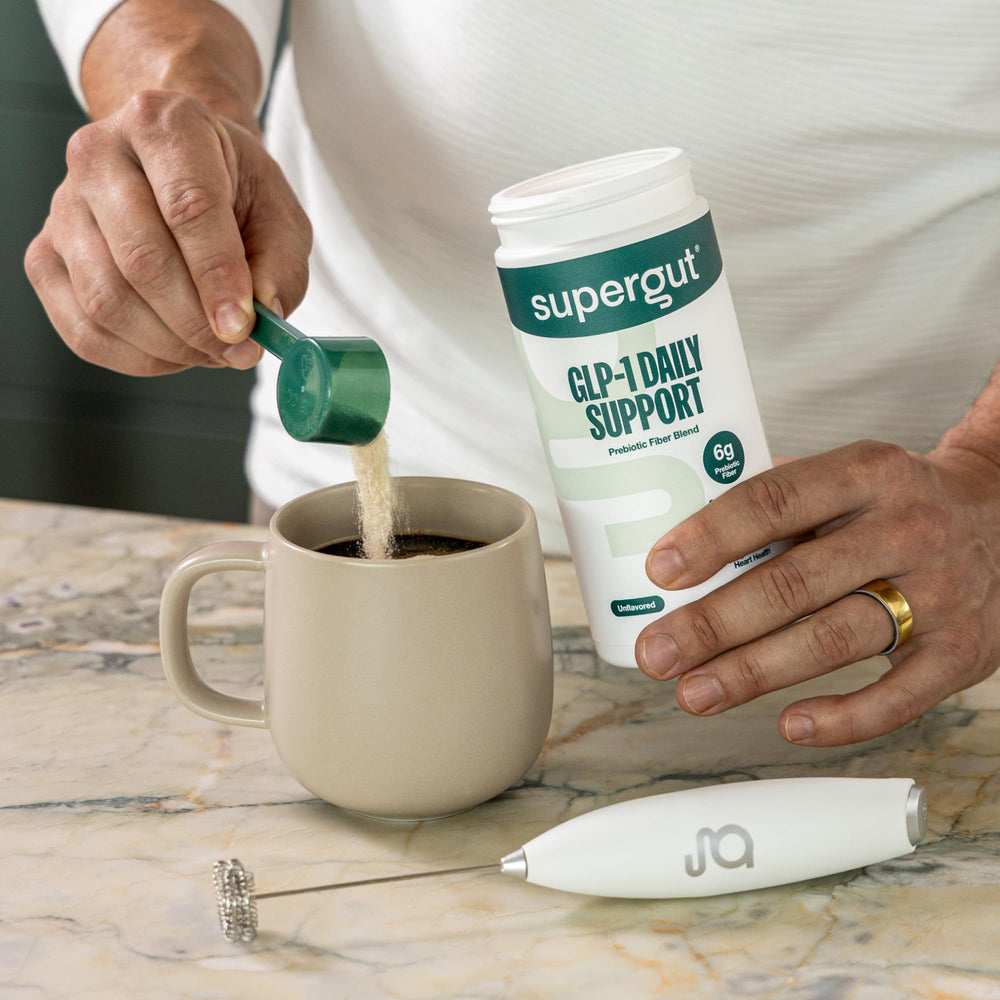 Daily routine scene with Supergut GLP-1 Daily Support ready for quick mix.
