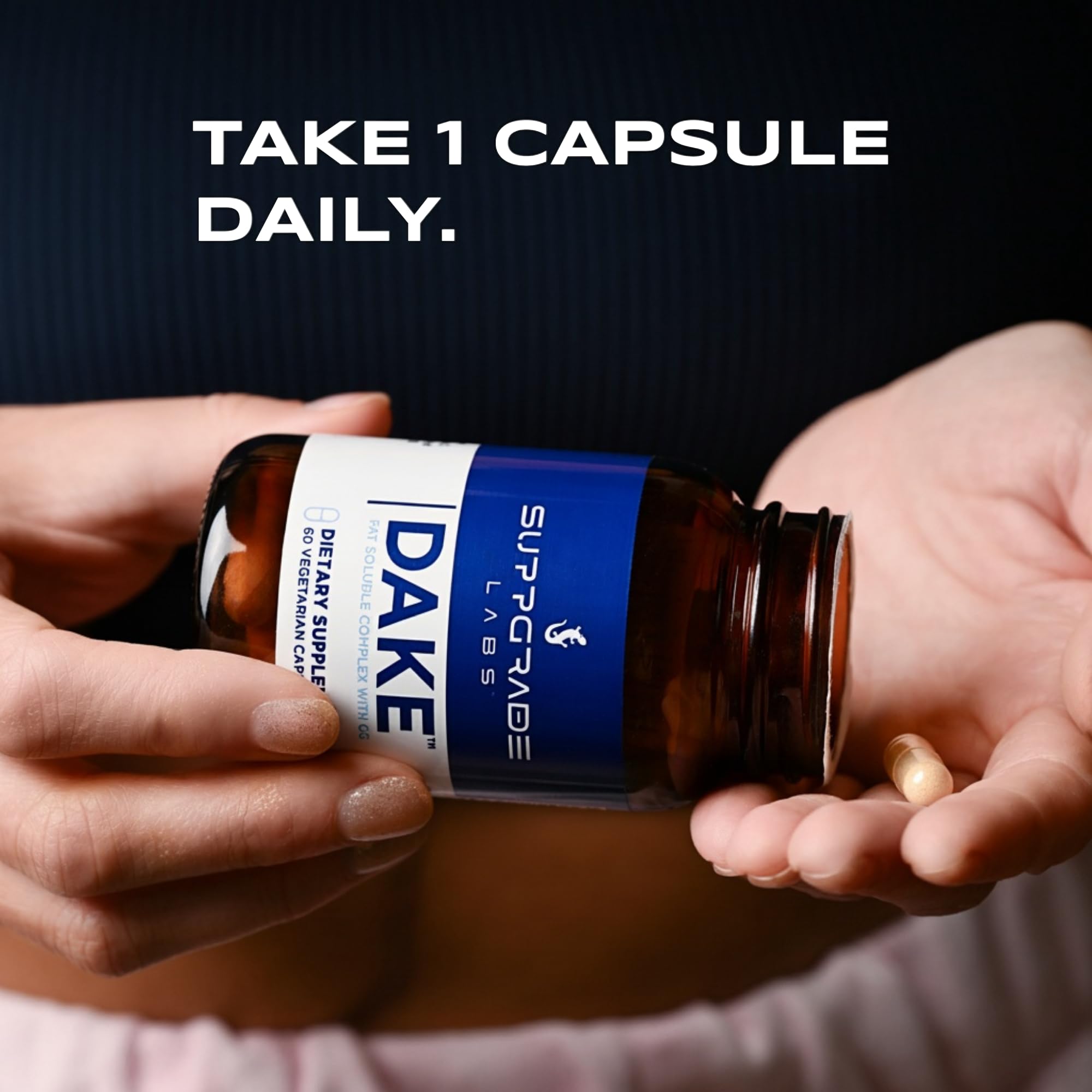 Pills in a dispenser showing precise daily dosing for DAKE.