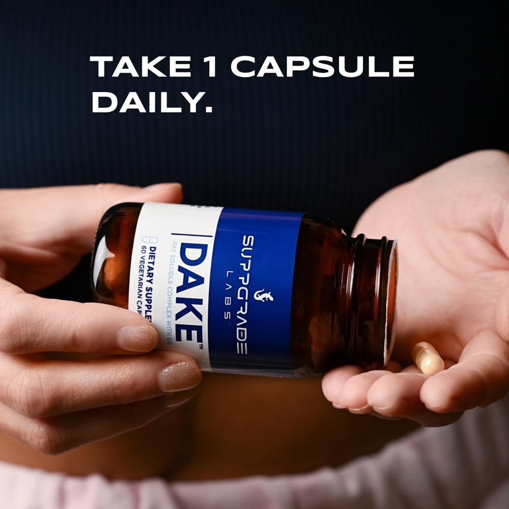 Pills in a dispenser showing precise daily dosing for DAKE.