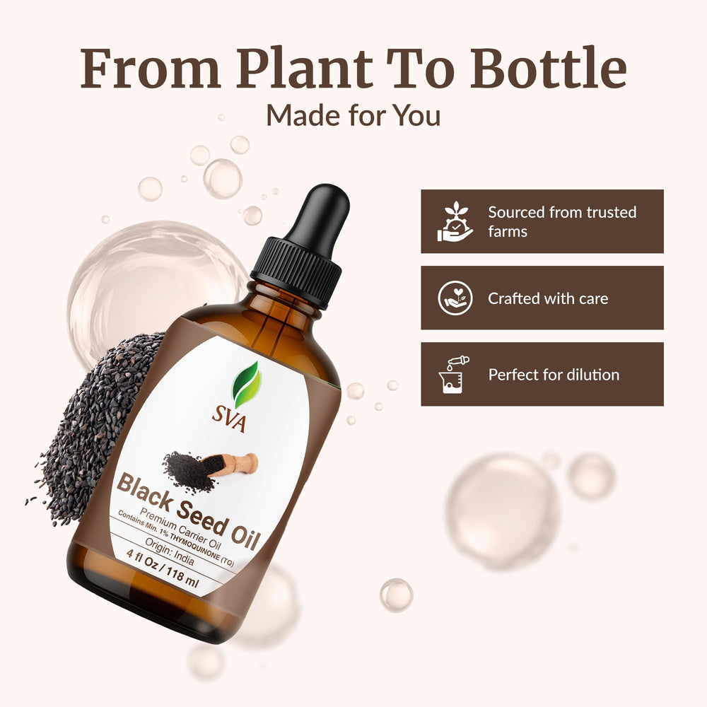 Massaging SVA Black Seed Oil into the scalp for conditioning.