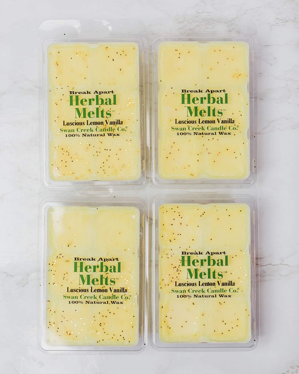 Swan Creek Luscious Lemon Vanilla Drizzle Melts being used with a wax warmer for aroma release