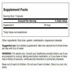 Huperzine A capsules closeup highlights standardized mental nutrition.