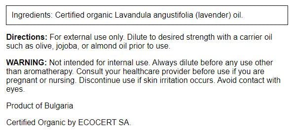 Swanson Lavender Essential Oil label close-up emphasizes purity for diffusing.
