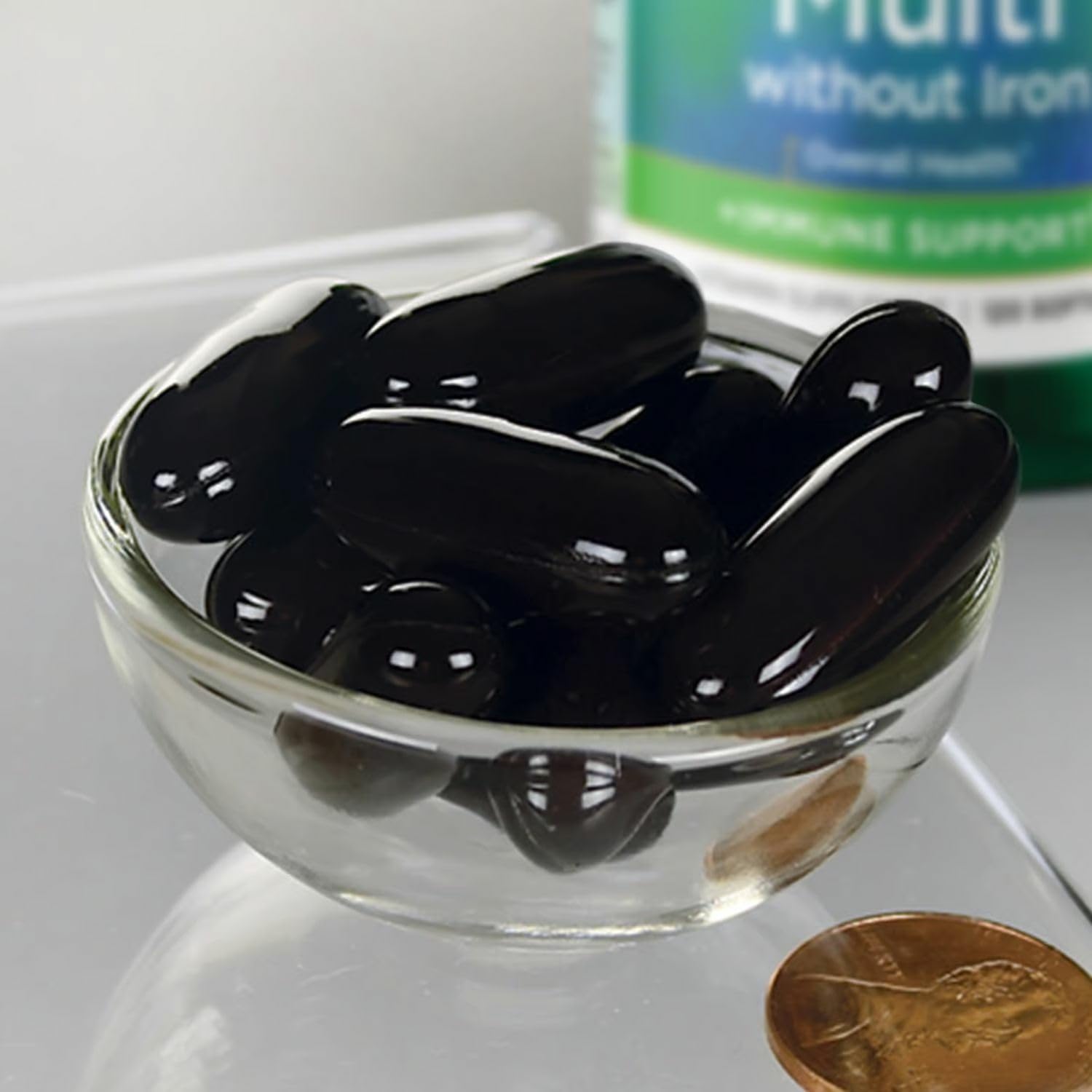 Closeup of Swanson softgels, smooth and easy to swallow.