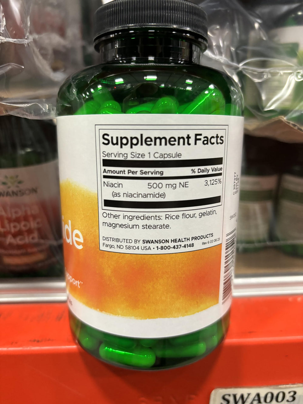 Real-life scene of daily wellness routine with Swanson Niacinamide supplement.