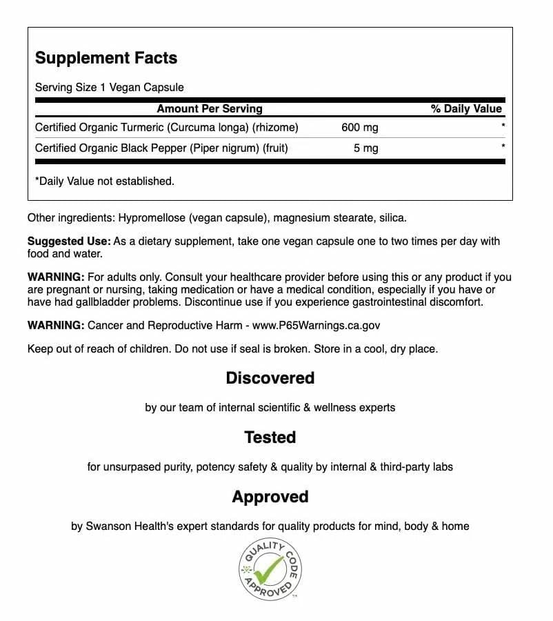 Swanson Premium Turmeric & Black Pepper bottle label close-up with organic vegan gluten-free notes.
