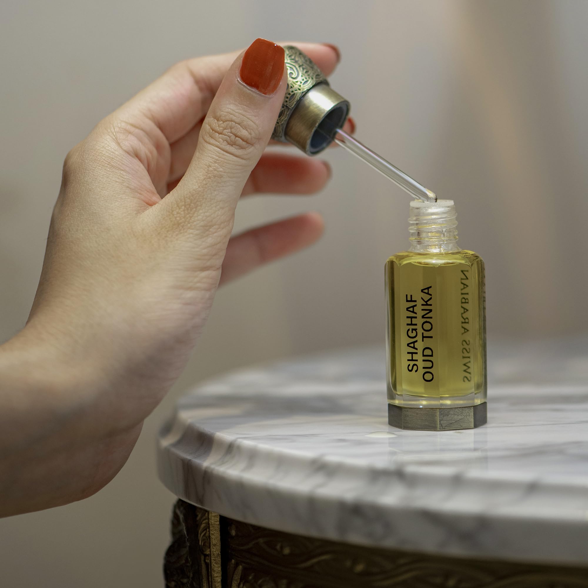 Swiss Arabian Shaghaf Oud Tonka bottle features Turkish rose in the heart for elegance.