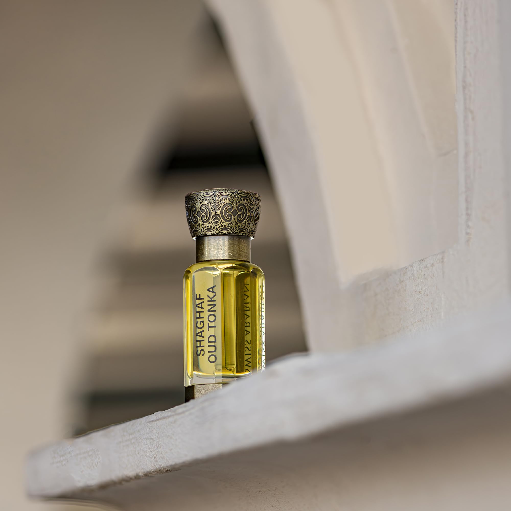 Swiss Arabian Shaghaf Oud Tonka base with tonka and vanilla deepens sweetness.