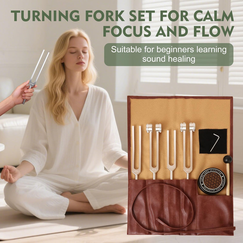 Syizyen activator paired with tuning forks for tabletop use
