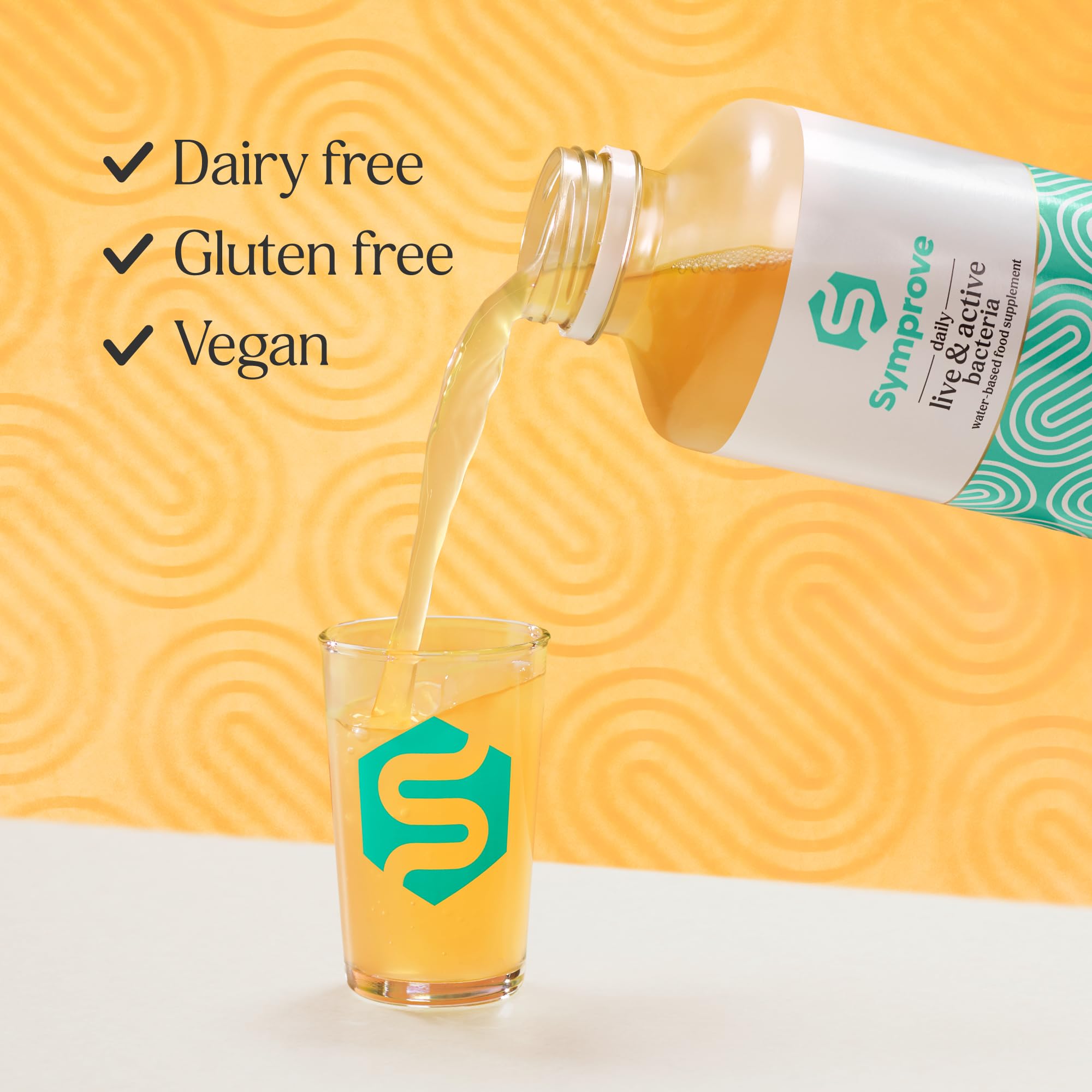 Symprove Mango Passionfruit pour into glass over ice