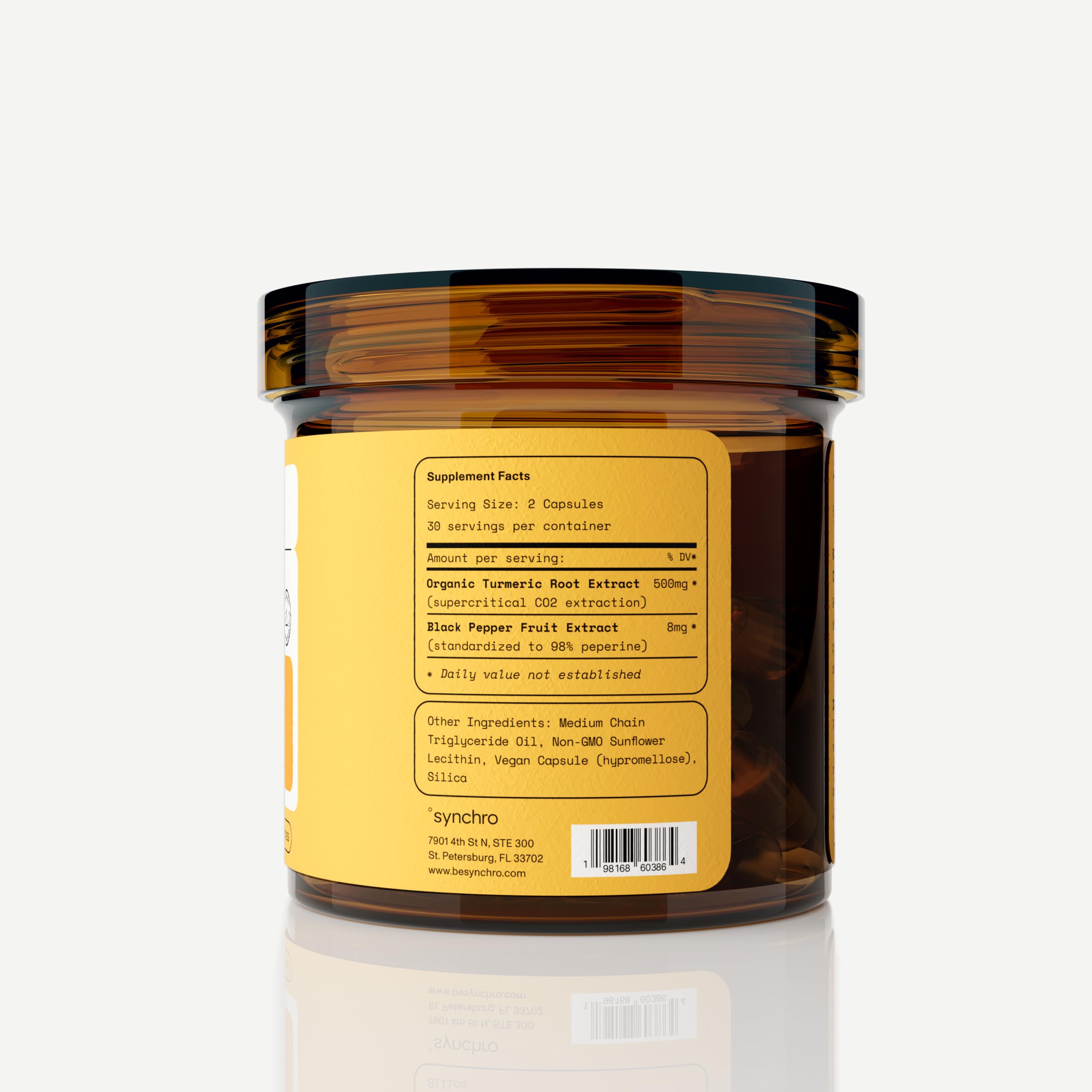 Synchro Gold capsules on neutral background highlight whole-plant extract approach.