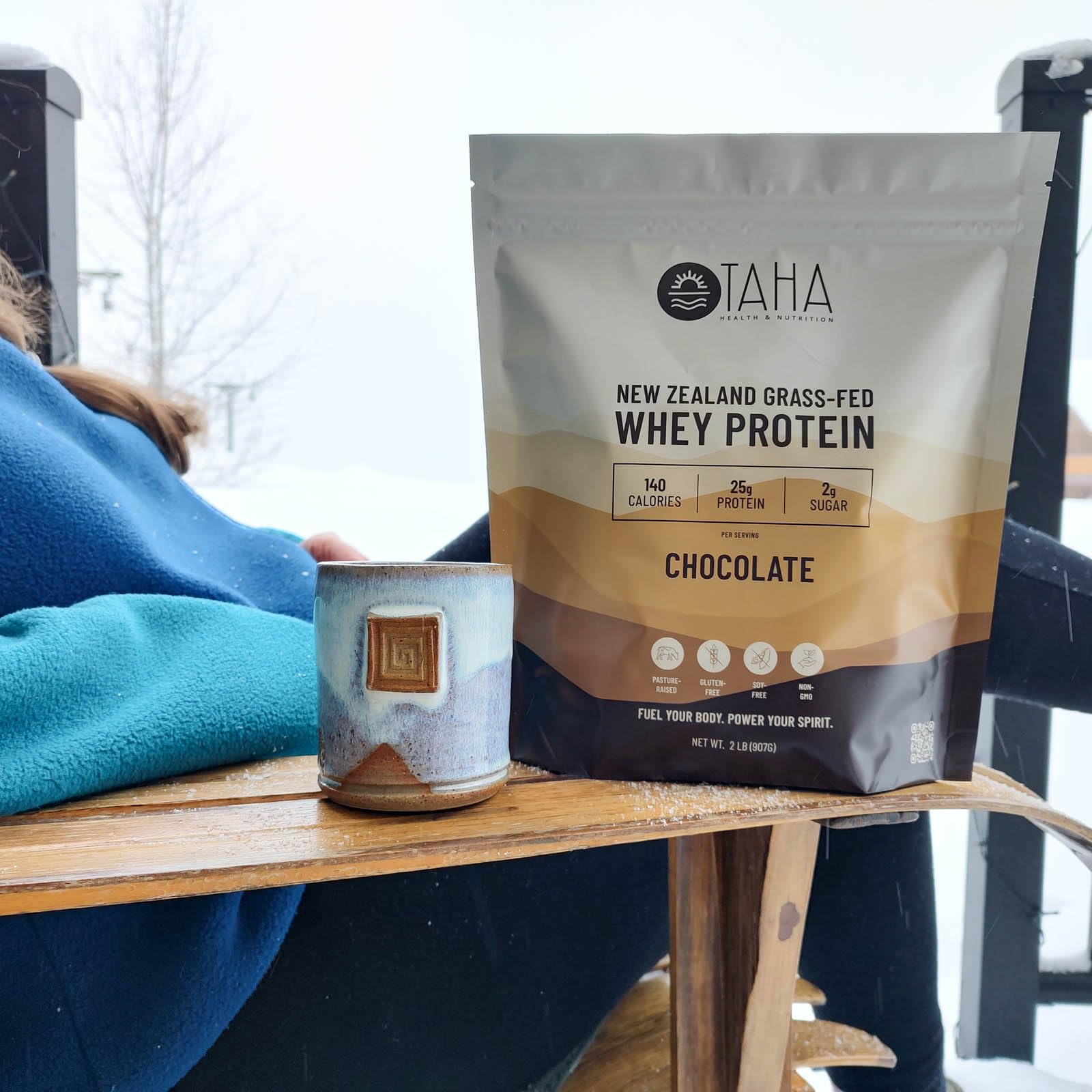 Taha chocolate whey protein stirred into yogurt for extra protein