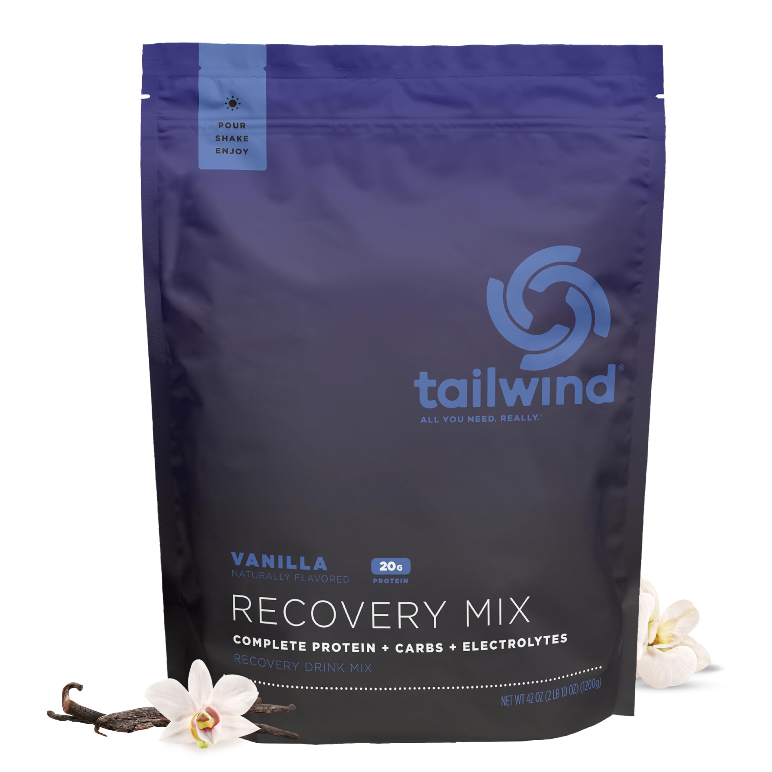 Tailwind Nutrition Recovery Mix scoop beside glass indicates easy mixing after workouts