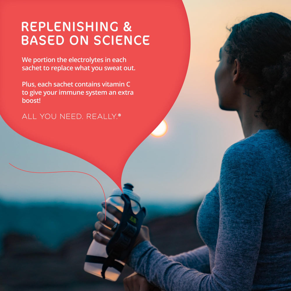 Tailwind Rapid Hydration berry sachet beside a sports bottle during activity
