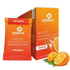 Tailwind Rapid Hydration orange sachet dissolves quickly in water for fast electrolytes.