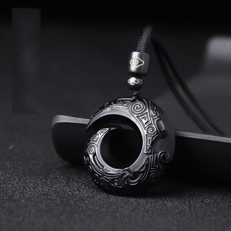 Tamhope Lucky Bird carved pendant close-up showcasing craftsmanship.