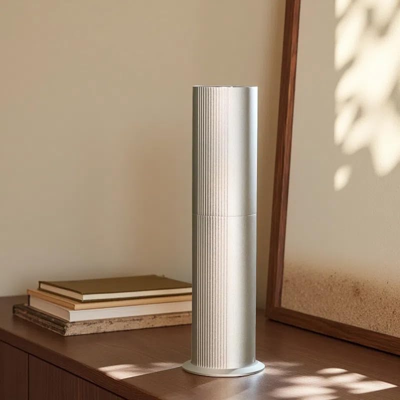 Tanoxi waterless diffuser in silver finish, compact 100ml capacity for easy living room scent.