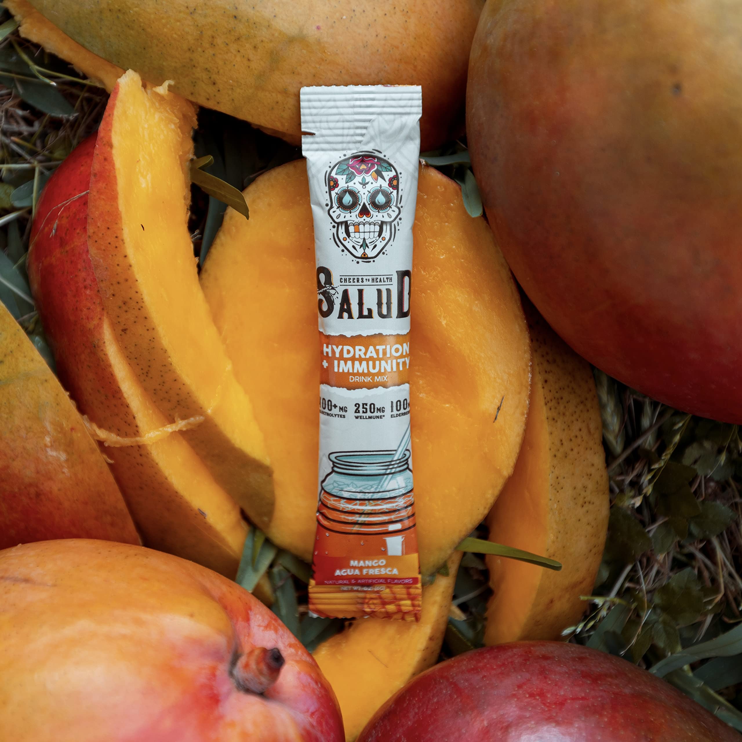 Taste Salud low calorie mango mix poured over ice for a light drink