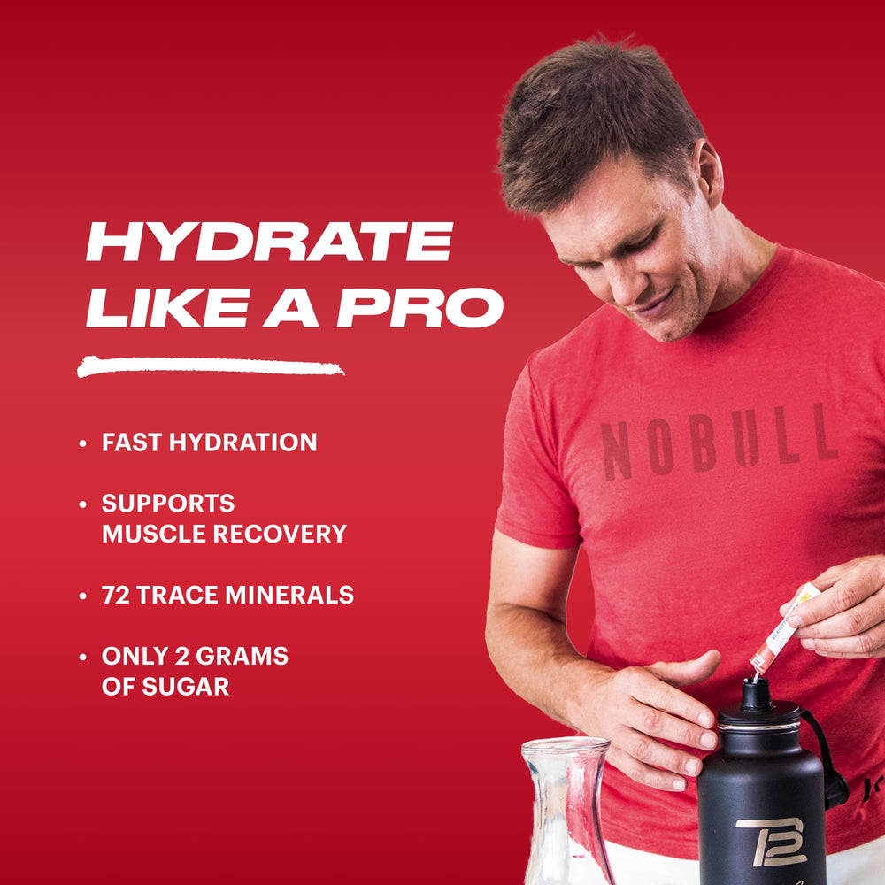 TB12 Electrolytes Fruit Punch stickpack opened for quick mix.