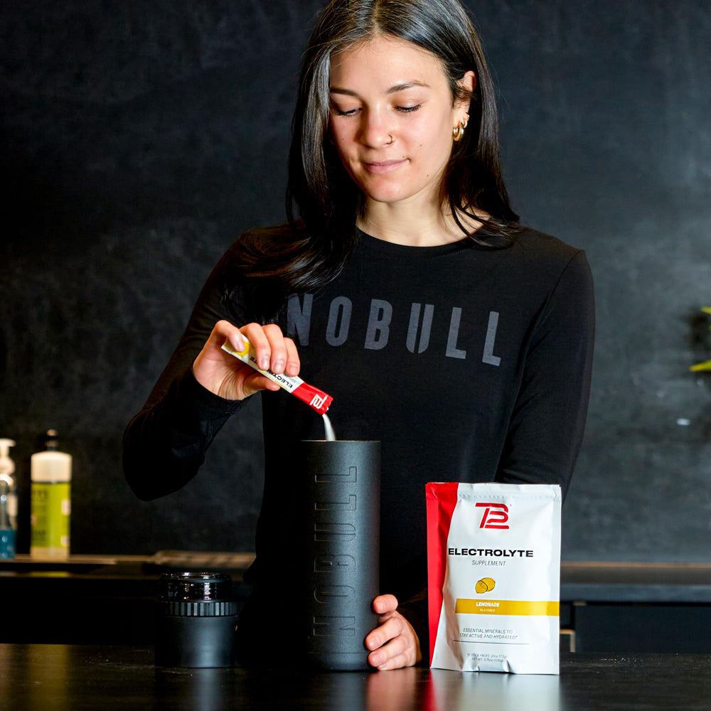 TB12 Electrolytes Lemonade stickpack in a travel kit for daily hydration