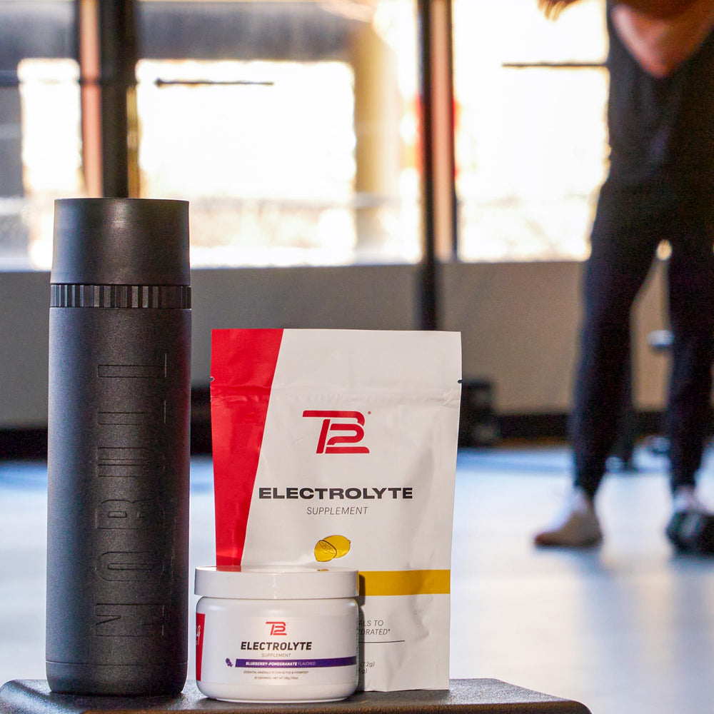 TB12 blueberry pomegranate electrolyte packaging on desk for daily use