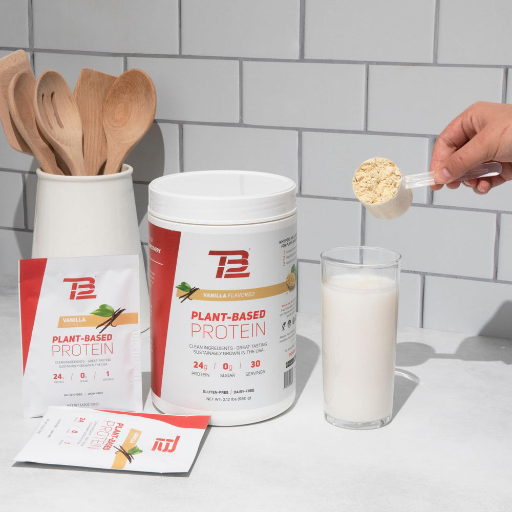 TB12 vanilla flavor powder beside a nutritious breakfast bowl.